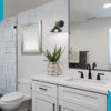 White tile bathroom with spacious vanity