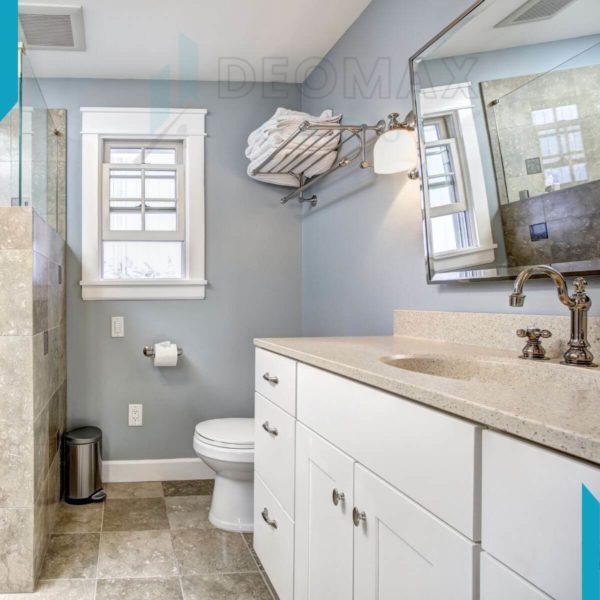Bathroom with Blue Walls and cream shower